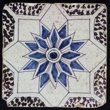 Sprinkled ornament tile, center double circle, double eight-pointed blue star, against background of two white eight-pointed
