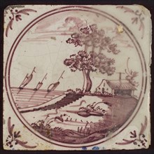 Scene tile, inside double circle house with tree on hill, corner motif oxen head, wall tile tile sculpture ceramic earthenware