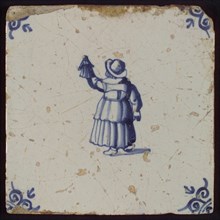 Scene tile, child's play, girl with doll, corner motif ox's head, wall tile tile sculpture ceramic earthenware glaze, baked 2x