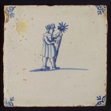 Scene tile, child's play, child with Epiphany, corner motif ox's head, wall tile tile sculpture ceramic earthenware glaze, baked