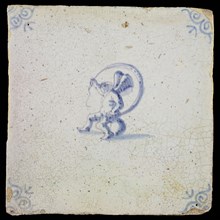 White tile with blue seated putto; corner pattern ox head, wall tile tile sculpture ceramic earthenware glaze, baked 2x glazed