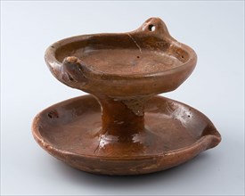 Earthenware oil lamp, two handle holes in top edge, underneath drip tray with pouring lip, oil lamp lamp lighting fixture soil