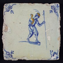 White tile with yellow and blue man with spear and shield, Ox-head corner motif, wall tile tile sculpture ceramic earthenware