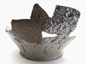 Fragments of large stoneware Bartmann jug, also called Bellarmine jug, with cartouches, Bartmann juggeruik tableware holder soil