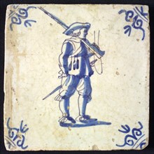 White tile with blue warrior; corner pattern ox head, wall tile tile sculpture ceramic earthenware glaze, baked 2x glazed