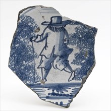 Fragment majolica dish with walking man in blue on white ground, dish crockery holder soil find ceramic earthenware glaze tin