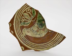 Fragment earthenware dish decorated in sludge technology with circles and bird, dish plate crockery holder soil find ceramic