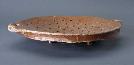 Pottery colander on three legs, two horizontal hook ears, colander kitchenware utensils earth discovery ceramics earthenware