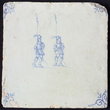 White tile with two blue warriors with spears; corner pattern ox head, wall tile tile sculpture ceramics pottery glaze, baked 2x
