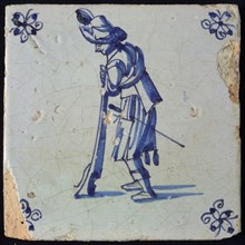 White tile with blue warrior; corner motif spider, wall tile tile sculpture ceramic earthenware glaze, baked 2x glazed painted