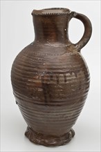 High stoneware jug be used with wheel decoration, standing ear, pinched foot ring, jug be found on the floor ceramic stoneware