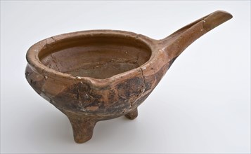 Pottery saucepan on three legs, with pouring spout and slanted, scalloped handle, saucepan cooking pot crockery holder