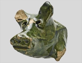 Fragments of pottery piggy banks, two muzzle fragments and one leg, green glazed, piggy bank piggy bank holder fragment