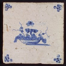 White tile with blue fruit basket with insect, corner motif spider, wall tile tile sculpture ceramic earthenware glaze, baked 2x