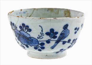 Faience tea bowl, bowl with blue decor in Oriental style, with flower sprays, birds and butterflies, bowl crockery holder soil