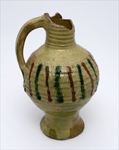 Yellow pottery jug, on belly vertical brown and green lines for ornamentation, radification, oil jug tableware holder soil find