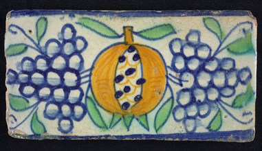 Border tile, with pomegranate, bunches of grapes and leaves, edge tile wall tile tile sculpture ceramic earthenware glaze, baked