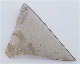 Two fragments of clear beaker, bottom and part of rim, beaker drinking glass drinking utensils tableware holder soil find glass