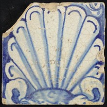 Tile of chimney pilaster, blue on white, shell-like white headdress, chimney pilaster tile pilaster footage fragment ceramics