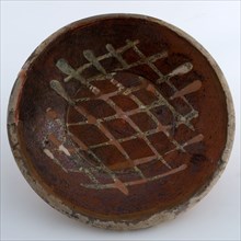 Earthenware plate with yellow waffle pattern in sludge technology, plate crockery holder soil find ceramic earthenware glaze
