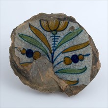 Fragment majolica dish on stand, polychrome tulip as show, plate dish crockery holder soil find ceramic earthenware glaze tin