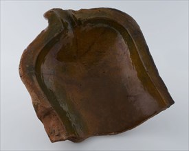 Fragment of earthenware grease trap with gutter, grease trap baking utensil holder soil find ceramic earthenware glaze lead