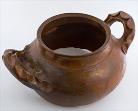 Fragment earthenware storage jar with comb decoration on the shoulder and ruffled ears, storage jar pot holder soil find