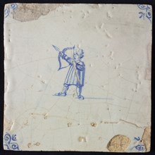 White tile with blue warrior shooting with bow and arrow; corner pattern ox head, wall tile tile sculpture ceramics pottery