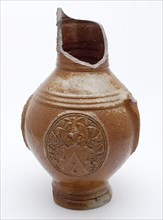 Stoneware jug be worn with frieze around neck, three weapon medallions and profile rings on the belly, jug crockery holder soil