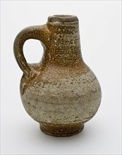 Small stoneware jug with standing ear, worn glaze, jug crockery holder soil find ceramic stoneware clay engobe glaze salt glaze