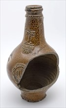 Brown speckled Bartmann jug, also called Bellarmine jug, under beard mask part of medallion, beardmug tableware holder soil find