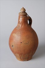 Brown Bartman jug, also called Bellarmine jug, jar with matching stopper, Bartmann juggeruik tableware holder soil find ceramic