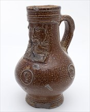 Brown speckled Bartmann jug, also called Bellarmine jug, on the belly three round portrait medallions, wide and high neck