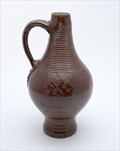 Brown stoneware jug with rings around neck, belly decorated with stamped square ornaments, jug crockery holder soil find ceramic
