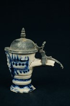 Neck of stoneware jug, tin valve cover, under pouring mask, ear piece, jug crockery holder fragment soil find tin ceramics