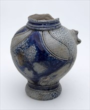 Stoneware jug with belly and shoulder carved ornament and embossed floral motifs for decoration, jug crockery holder soil find