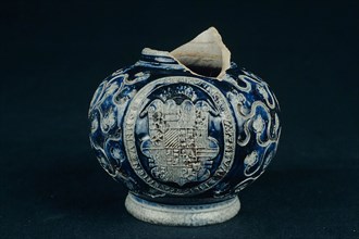 Fragment stoneware bell jar with crowned coat of arms in medallion, sgraffito and blue glaze, Bullet chuck jug crockery holder