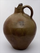 Stoneware jug with long sausage ear, brown glazed, profile rings around the neck, jug crockery holder soil find ceramic
