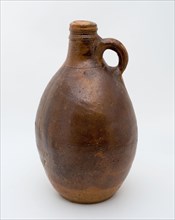 Brown jar with ear, jug crockery holder soil find ceramic stoneware glaze salt glaze, hand turned baked glazed stoneware jug