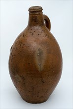 Stoneware jug with sausage ear, brown glazed, marked on the shoulder, jug holder soil find ceramic stoneware glaze salt glaze