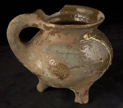 Pottery cooking jug, grape model, decorated in sludge technology, on three outstanding legs, grape cooking pot tableware holder