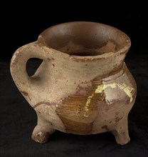 Pottery cooking jug, grape model, decorated in sludge technology, on three outstanding legs, grape cooking pot tableware holder