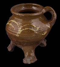 Pottery cooking jug, grape model, decorated in sludge technology, on three claw feet, grape cooking pot crockery holder