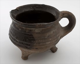 Pottery cooking jug, grape-model, beige shard, lead glaze, sausage ear, shank, on three legs, cooking pot crockery holder
