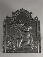 Fireback with bowl of flowers, hob plate cast iron, cast Rectangular with arch at the top on which dolphins. In the middle