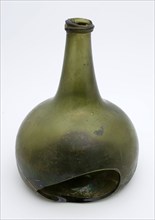 Green bell-shaped bottle, bottle bottle holder soil find glass, bottom. Body with convex wall with large hole and burst
