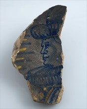 Soul fragment of polychrome majolica dish with an image of man with millstone collar, plate crockery holder soil find ceramic
