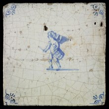 White tile with blue putto with drum, ox-head in the corners, wall tile tile sculpture ceramic earthenware glaze, baked 2x
