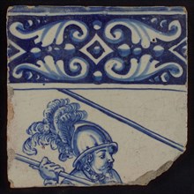 Tile of tableau with top decorated in blue and man with helmet and skewer, tile picture footage fragment ceramics pottery glaze