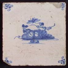 White tile with blue fruit and insect, corner motif spider, wall tile tile sculpture ceramic earthenware glaze, baked 2x glazed